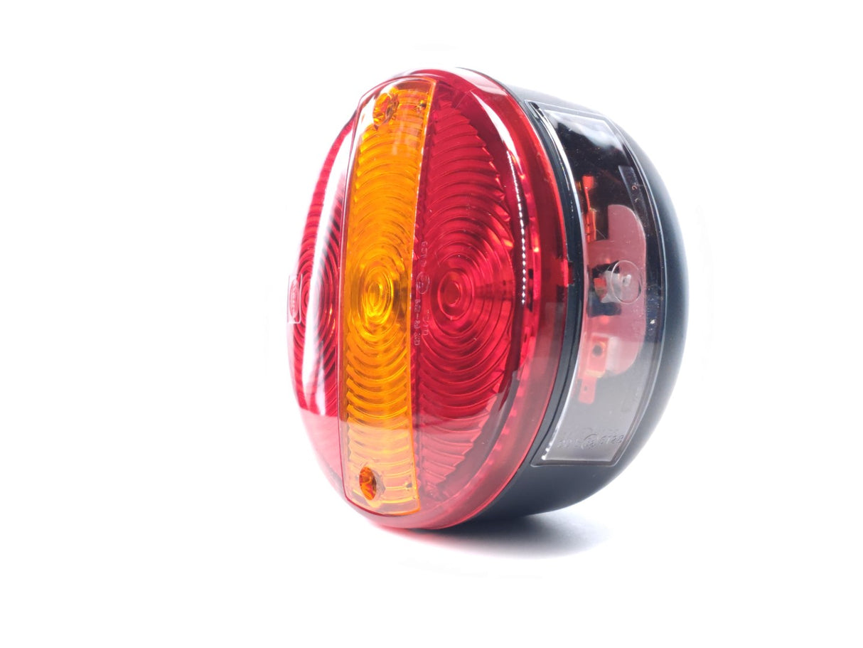 Round Tail Light with Number Plate Illumination - Left Side